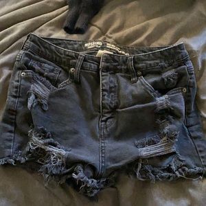 Black torn shorts